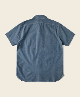 Blue chambray work shirt back view, short sleeves, yoke seam detail