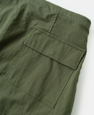 Olive trousers shell with front flap pockets and straight stitched center seam
