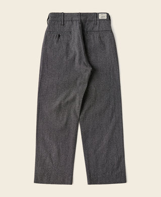 Salt and pepper trousers flat lay with belt loops, button closure, and straight hem
