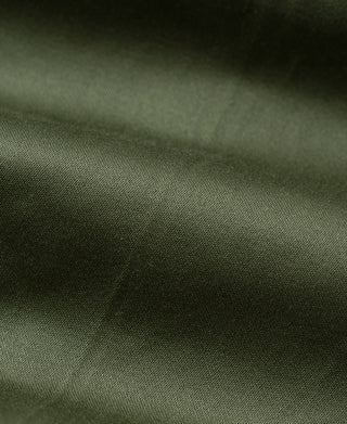 Olive arctic trousers shell fabric close-up with fine woven texture