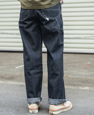 Indigo denim carpenter pants with side cargo pocket and contrast-stitched seams