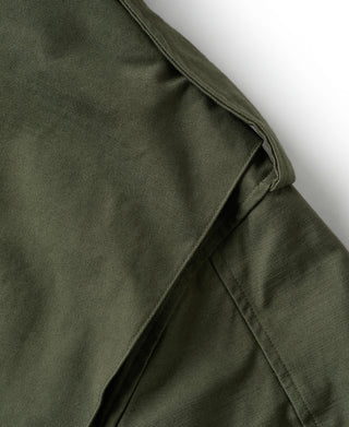 Olive field jacket shoulder and side seam closeup