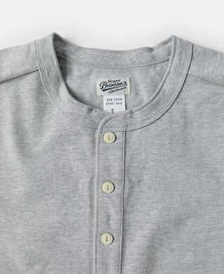 Gray henley T-shirt neckline with three-button placket and ribbed trim