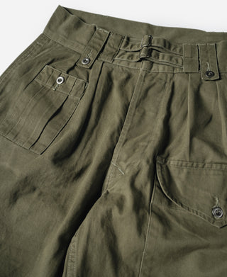 Olive Bermuda pants with pleated front, button waistband, and flap side pockets