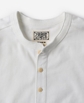 White henley neckline with button placket and Bronson Mfg Co label