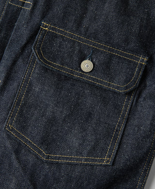 Indigo denim chest pocket with flap and round metal snap