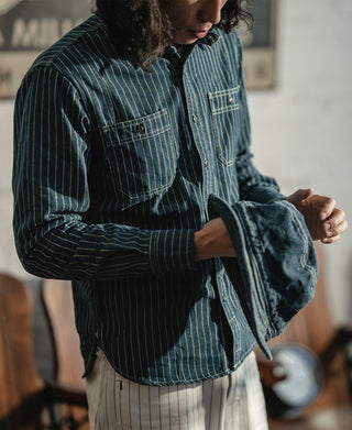 Indigo Wabash work shirt worn front view with button front and chest flap pockets.