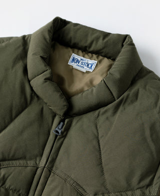 Olive quilted padded vest interior label near stand-up collar and zipper