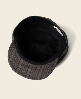 Dark gray yarn-striped newsboy cap showing black inner lining and stitched brim