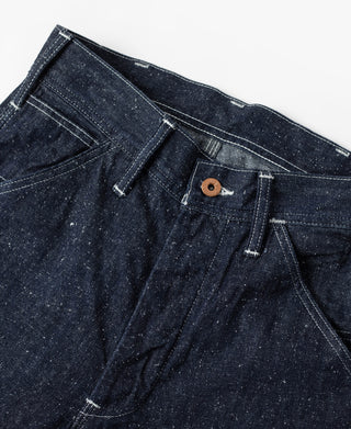 Indigo denim waistband with button fly and stitched utility pocket