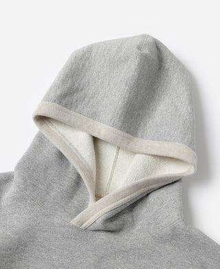 Gray pullover hoodie with off-white ribbed hood lining and double-layer hood edge.