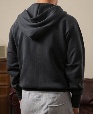Black full-zip hoodie, back view, adjustable drawstring hood