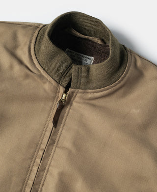 Khaki deck jacket close-up of stand collar and metal zipper