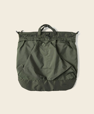 Olive nylon helmet bag with carry handle, drawstring closure, and gathered sides