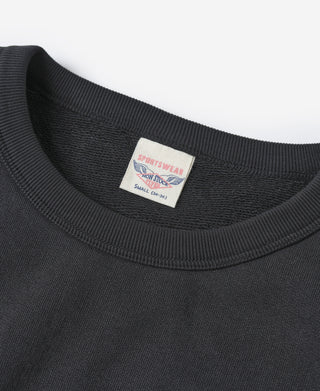 Black crewneck sweatshirt neckline with ribbed collar and interior brand label.