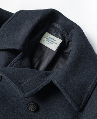 Navy peacoat collar and front double-breasted button detail