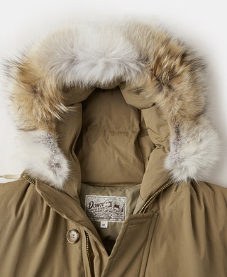 Faux fur hood detail on khaki polar down parka with inner brand patch