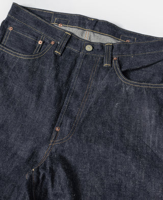 Indigo denim jeans front with button closure and angled front pockets