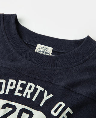 Navy crew-neck t-shirt with “BRONSON” label at neckline; printed “PROPERTY OF 28” graphic