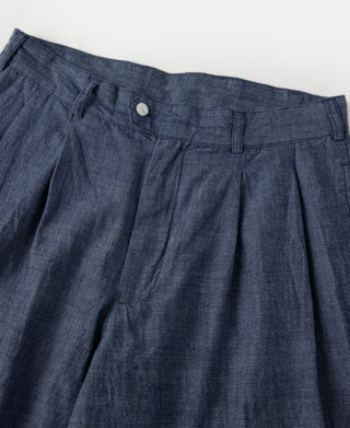 Indigo chambray pants waistband with front pleats and button closure