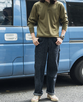 Olive long-sleeve wool henley shirt on model, three-button front
