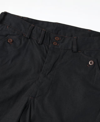 Black breeches waistband with belt loops and dark button front closure.