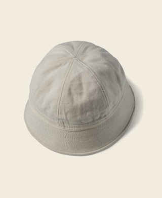 White domed dixie cup hat with crown seams and short brim