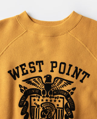 Yellow raglan sweatshirt close-up of West Point chest logo
