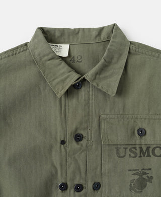 Olive utility jacket collar with buttons and embroidered USMC patch on chest