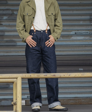 Indigo selvedge denim jeans on model, straight fit with button closure