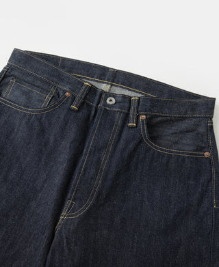 Indigo denim jeans waist detail with belt loops, button closure, and coin pocket