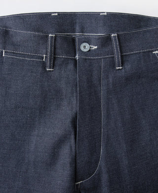 Indigo dungaree pants waistband with button closure and front seam detail