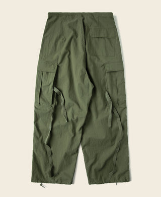 Olive arctic utility trousers with cargo pockets and drawstring hem; multiple utility tabs