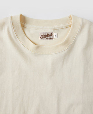 Off-white cotton crew-neck T-shirt with neck label inside collar