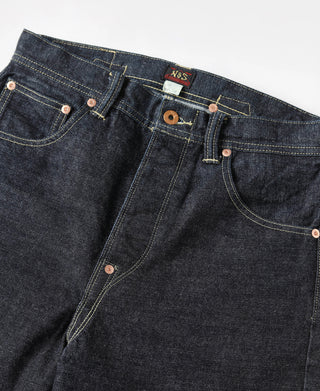 Indigo denim jeans waistband with belt loops, copper snap buttons, and pocket seams