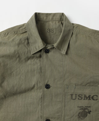 Olive utility jacket close-up of collar and front buttons with USMC chest patch