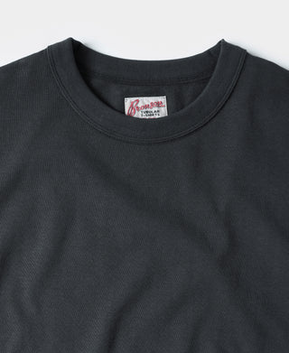 Men's vintage black crew-neck athletic T-shirt with ribbed collar and logo tag