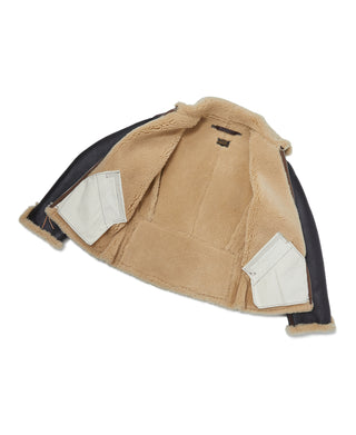 Dark brown flight jacket interior view with tan shearling lining and label detail