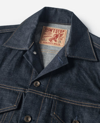 Indigo selvedge denim jacket collar with interior fabric brand label