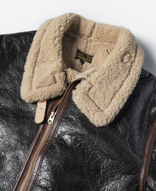 Dark brown leather flight jacket with tan shearling collar and front zipper detail