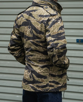 Camo tiger-stripe M-65 jacket with chest pockets, buttons, and buttoned cuffs