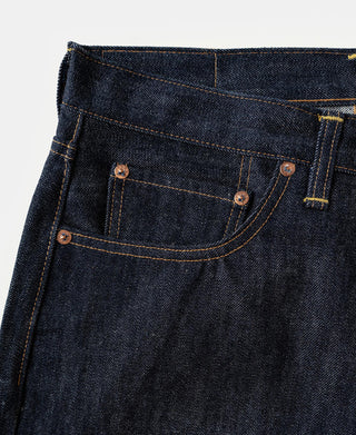 Indigo selvedge denim jeans front waistband with copper buttons and coin pocket