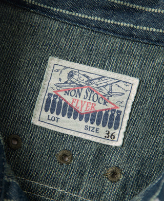 Inside neck label on indigo striped work shirt, size 36
