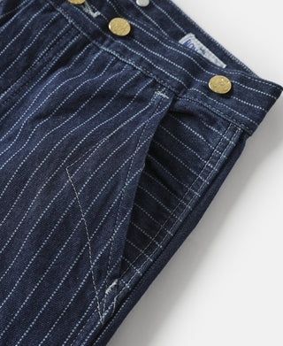 Indigo pinstripe pants detail with front patch pockets and stitched seams