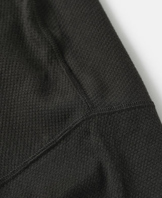 Black waffle-knit t-shirt sleeve with stitched seam detail