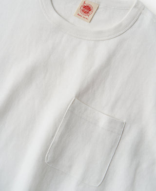 White cotton T-shirt front pocket detail with red neck label