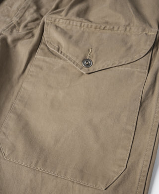 Khaki bermuda shorts with flap pocket and metal button at waistband