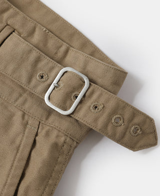Khaki adjustable belt with metal buckle on bermuda pants waistband