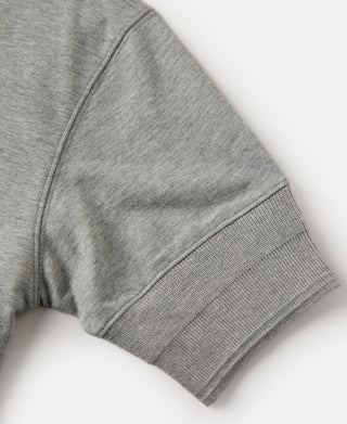 Gray henley T-shirt sleeve close-up with ribbed cuff and stitched sleeve seam