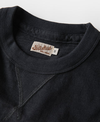 Black cotton T-shirt collar with label and tubular gusset detail